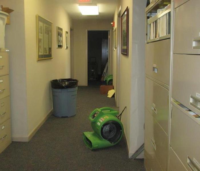 Drying equipment on floor.