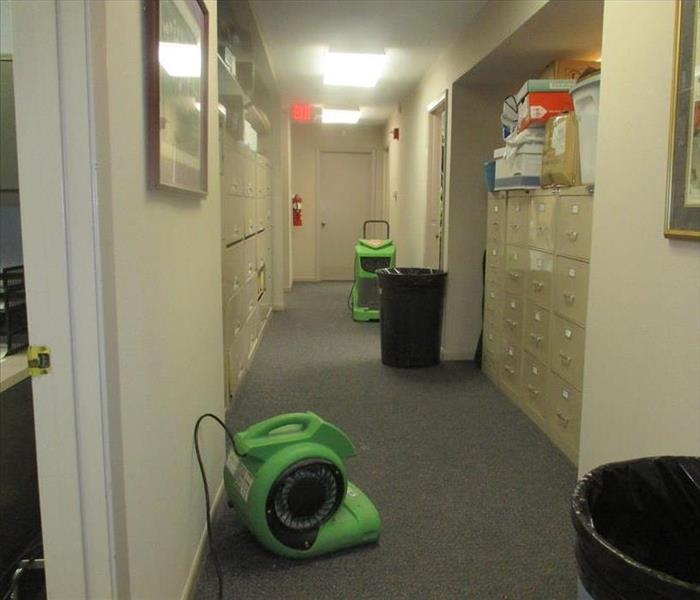 Drying equipment on floor.